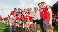 Joe Miskella and Eanna Lynch celebrate with Ballincollig teammates  5/7/2026