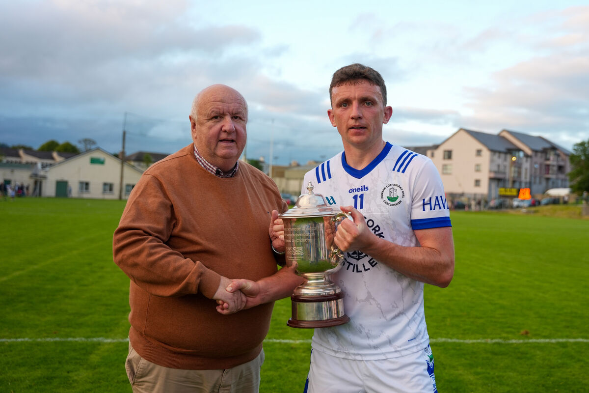 Noel O’Callaghan presents the cup to Castlehaven captain Mark Collins. Picture: Noel Sweeney Noel O’Callaghan presents the cup to Castlehaven captain Mark Collins. Picture: Noel Sweeney