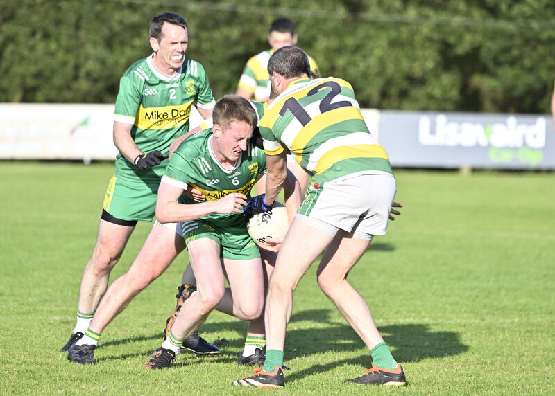 Joe O'Sullivan (St James) finds Alan Jennings (Carbery Rangers) blocking his progress in Clonakilty. Picture: Martin Walsh. Joe O'Sullivan (St James) finds Alan Jennings (Carbery Rangers) blocking his progress in Clonakilty. Picture: Martin Walsh.