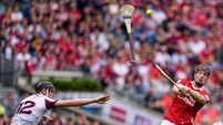Eoin Downey has a shot as a hurl comes his way 4/7/2026