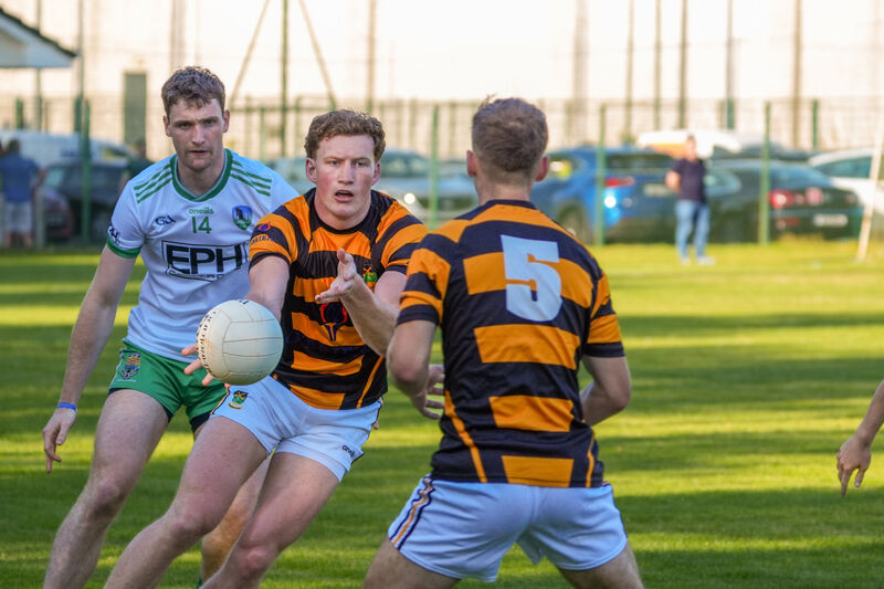 Colin O'Brien finds support as Muskerry’s Cillian Donovan closes in. Picture: Noel Sweeney Colin O'Brien finds support as Muskerry’s Cillian Donovan closes in. Picture: Noel Sweeney