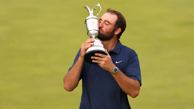 <p>Scottie Scheffler kisses the Claret Jug after winning the 2025 Open. </p>