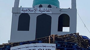 Replica of mosque placed on top of loyalist bonfire in Tyrone Replica of mosque placed on top of loyalist bonfire in Tyrone