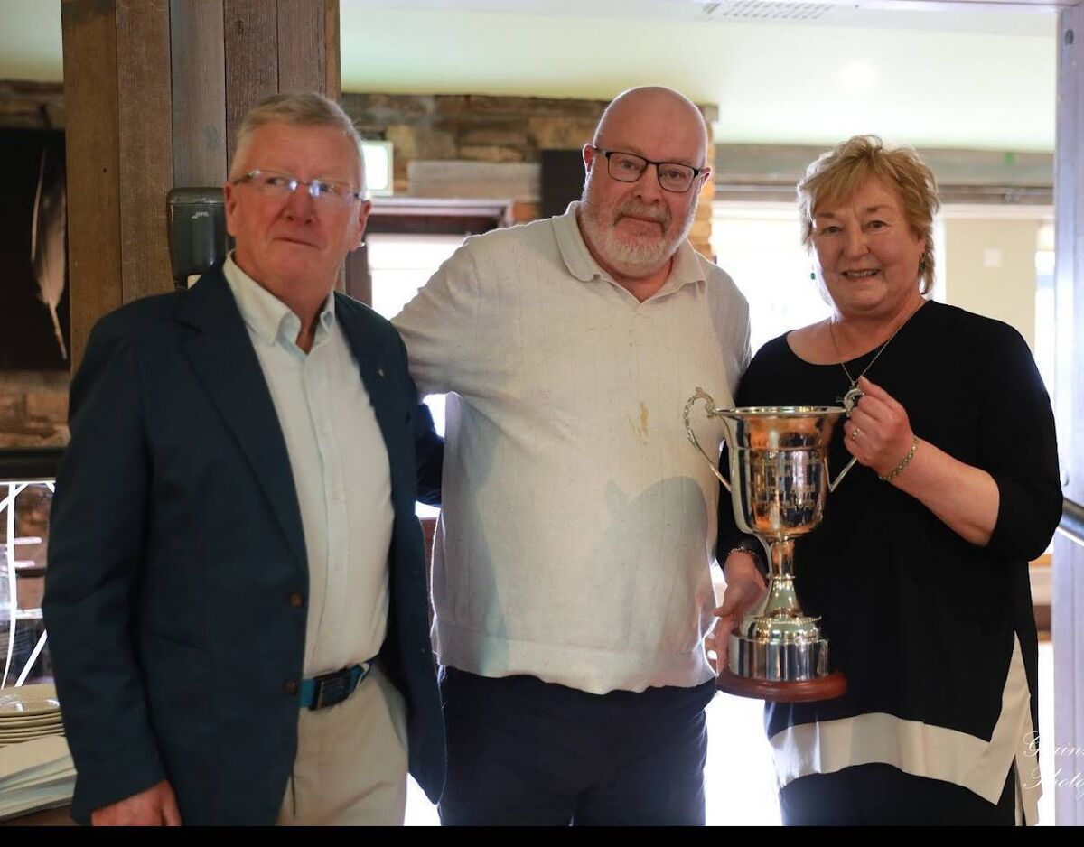 Cork Boxing: Dan O'Connell, John Morrissey and Vicky Ashton present the Cork Club of the Year, the winner of the Victor Ashton Cup, to the Golden Gloves Boxing Club. 