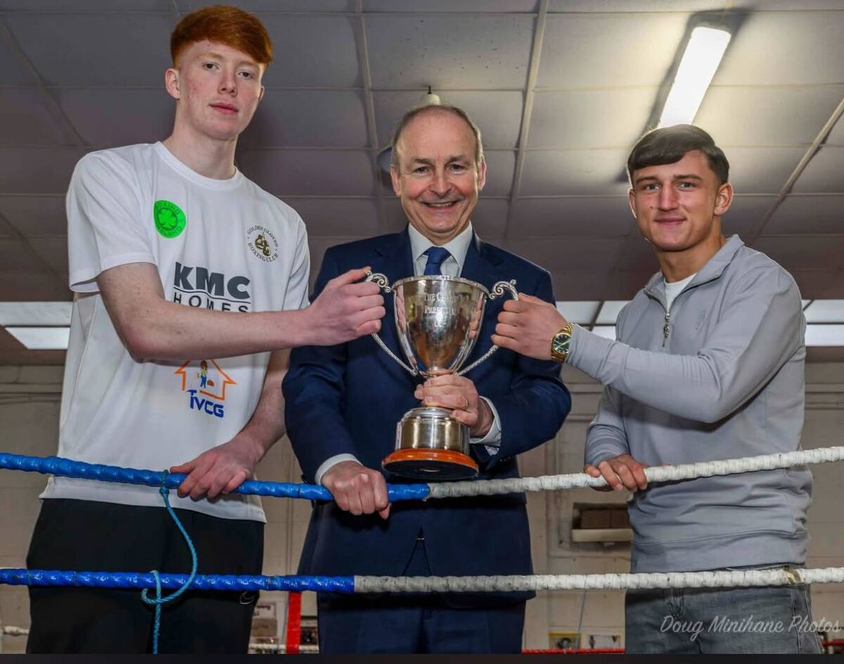 Cork Boxing: William Heaphy, Taoiseach Michael Martin and Kuba Pielzs with the Paddy Martin Cup. 
