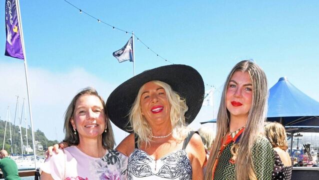 <p>Sandra Harrington with Maria and Enya Conway, at the Cork Week Ladies Day. </p>