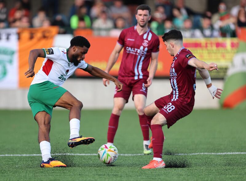  Luka Le Bervet, Cobh Ramblers, tackles Hans Mpongo, Cork City FC. Picture: Jim Coughlan.