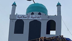 Police say mosque replica on top of loyalist bonfire is hate crime