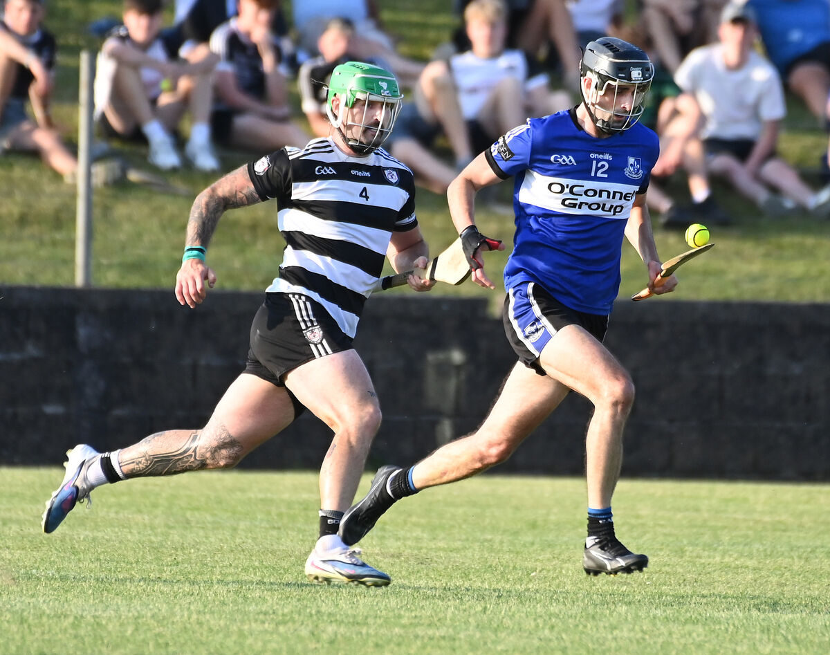 Sarsfields' Luke Hackett breaks from Midleton's Luke Dineen. Picture: Eddie O'Hare Sarsfields' Luke Hackett breaks from Midleton's Luke Dineen. Picture: Eddie O'Hare