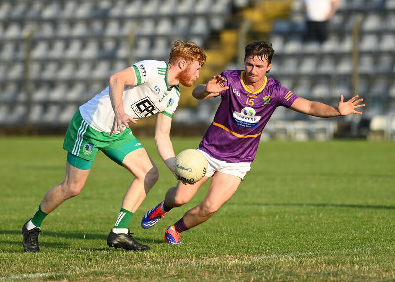 William Ronan of Muskerry is about to be tackled by Carbery's Olan O'Donovan. Picture: Martin Walsh