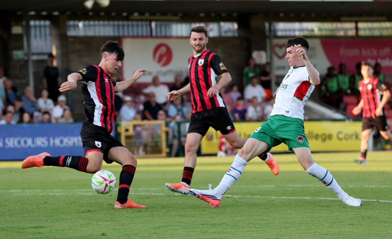 Cillian Murphy, Cork City, gets his shot away to equalise under pressure from Taylor McCarthy, Longford Town. Picture: Jim Coughlan. Cillian Murphy, Cork City, gets his shot away to equalise under pressure from Taylor McCarthy, Longford Town. Picture: Jim Coughlan.