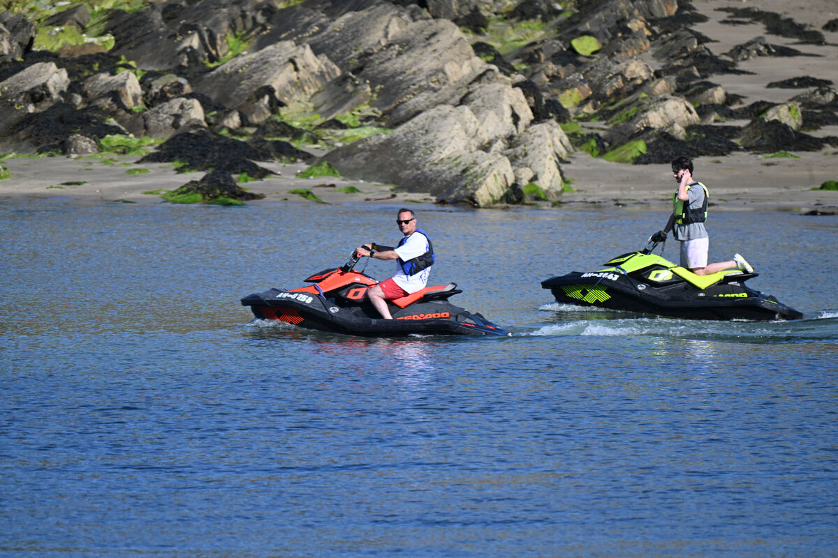 Jetskiers slowly pass Sandycove Island at Sandycove, Kinsale, Co Cork. Ireland will see temperatures climbing to the high 20s and early 30s celsius in some places this weekend. Picture: Larry Cummins Jetskiers slowly pass Sandycove Island at Sandycove, Kinsale, Co Cork. Ireland will see temperatures climbing to the high 20s and early 30s celsius in some places this weekend. Picture: Larry Cummins