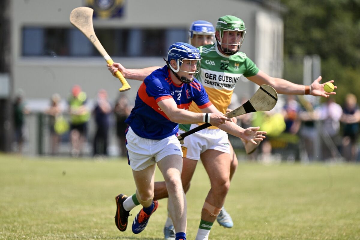 Erin's Own's Cian Dunphy is challenged by Bride Rovers Brian Roche during their league final tie at Lisgoold. Picture: Larry Cummins Erin's Own's Cian Dunphy is challenged by Bride Rovers Brian Roche during their league final tie at Lisgoold. Picture: Larry Cummins