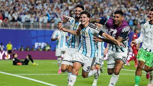 Argentina book England showdown by overcoming mighty challenge from Switzerland