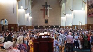 <p> Around 2,000 parishioners pack St Augustine’s Church as they follow the final procession from the altar, with worshippers filling every available space inside the church. Picture: Chani Anderson</p> <p> Around 2,000 parishioners pack St Augustine’s Church as they follow the final procession from the altar, with worshippers filling every available space inside the church. Picture: Chani Anderson</p>