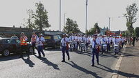 Orange parade past former Belfast flashpoint passes without incident