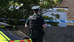 Police remain at the scene after three relatives found dead in family home Police remain at the scene after three relatives found dead in family home
