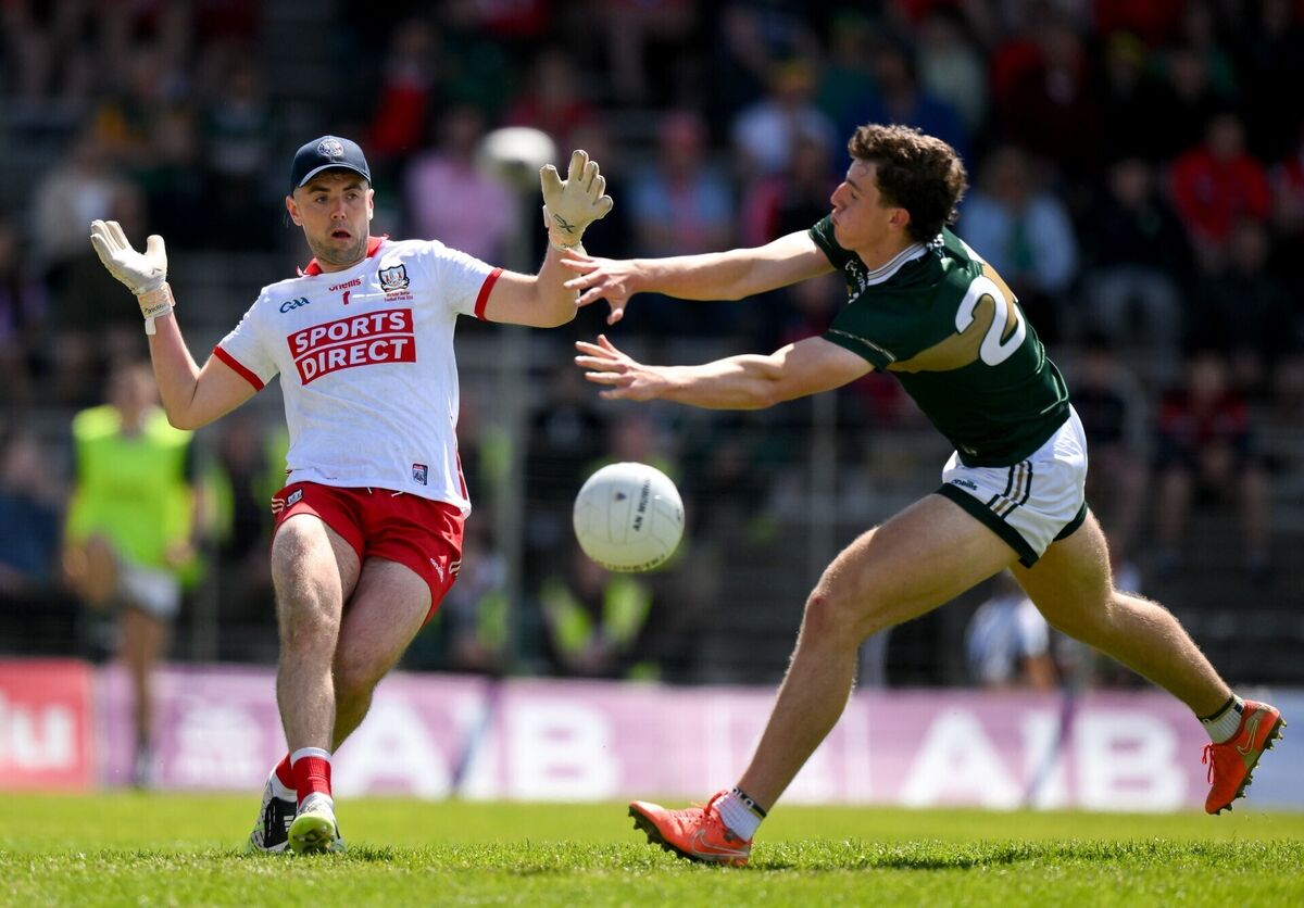 Cork goalkeeper Patrick Doyle clears under pressure from Tomás Kennedy of Kerry. Picture: Brendan Moran/Sportsfile Cork goalkeeper Patrick Doyle clears under pressure from Tomás Kennedy of Kerry. Picture: Brendan Moran/Sportsfile
