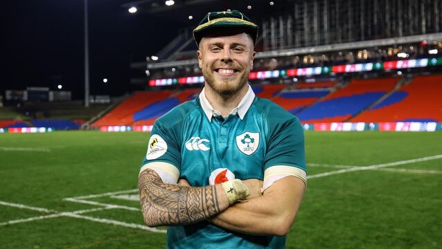 <p>Ireland's Sean Jansen with his first cap after making his debut for Ireland against Japan</p>