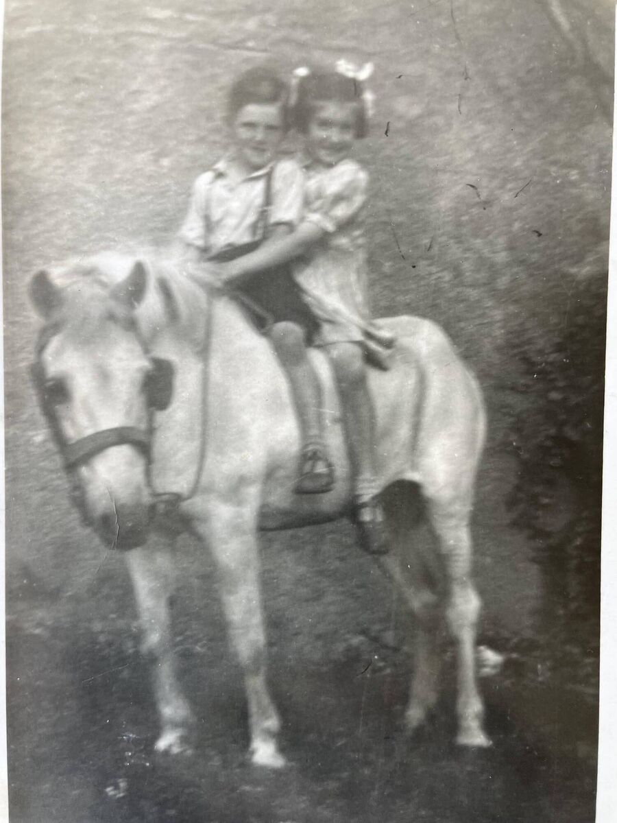 Micheál Kenefick and his late sister Joan on White Moses, their beloved family pony Micheál Kenefick and his late sister Joan on White Moses, their beloved family pony