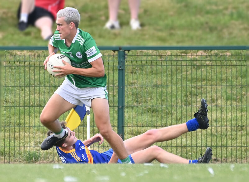 Ballincollig's Joe Miskella leaves Carrigaline's David Scannell-Murphy on the ground. Picture: Eddie O'Hare Ballincollig's Joe Miskella leaves Carrigaline's David Scannell-Murphy on the ground. Picture: Eddie O'Hare