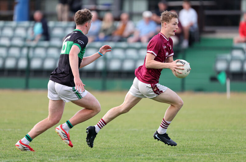 Cian Power, Nemo Rangers, moves in to challenge Alex Collins of Bishopstown. Picture: Jim Coughlan Cian Power, Nemo Rangers, moves in to challenge Alex Collins of Bishopstown. Picture: Jim Coughlan