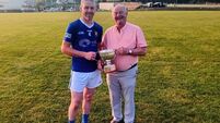 Award.jpg Ballinhassig inspired by Luke Fahy win the South East Junior A Hurling League Final with victory over Courcey Rovers