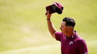Lucas Herbert leads Open after equalling record for lowest score at men’s major