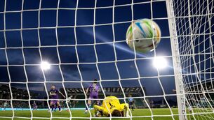 <p>Rovers’ Max Kovalevskis scores a goal past Cork goalkeeper Conor Brann. Picture: INPHO/Ryan Byrne</p>