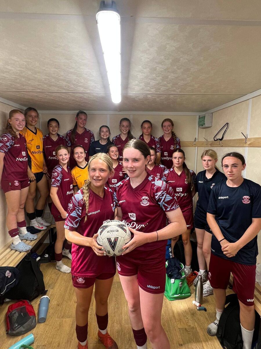 Cobh U17 captain Alex O’Flynn presents debutant Molly Dennis with the match ball after a hat-trick against Wexford. Cobh U17 captain Alex O’Flynn presents debutant Molly Dennis with the match ball after a hat-trick against Wexford.