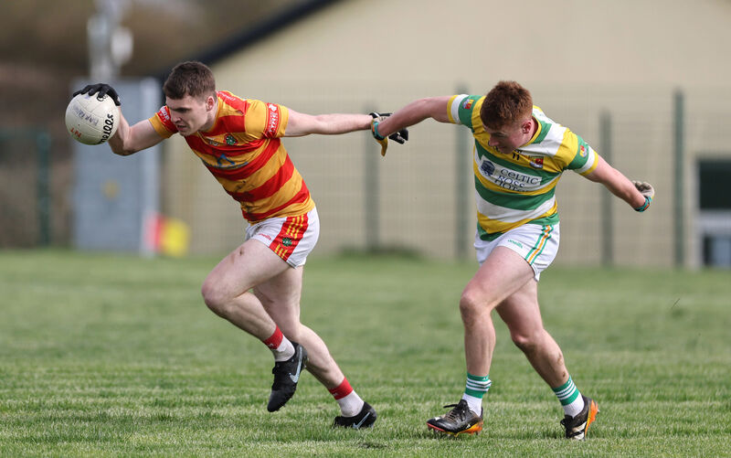 David Buckley, Newcestown, gets away from Paul Hodnett, Carbery Rangers. Picture: Jim Coughlan. David Buckley, Newcestown, gets away from Paul Hodnett, Carbery Rangers. Picture: Jim Coughlan.