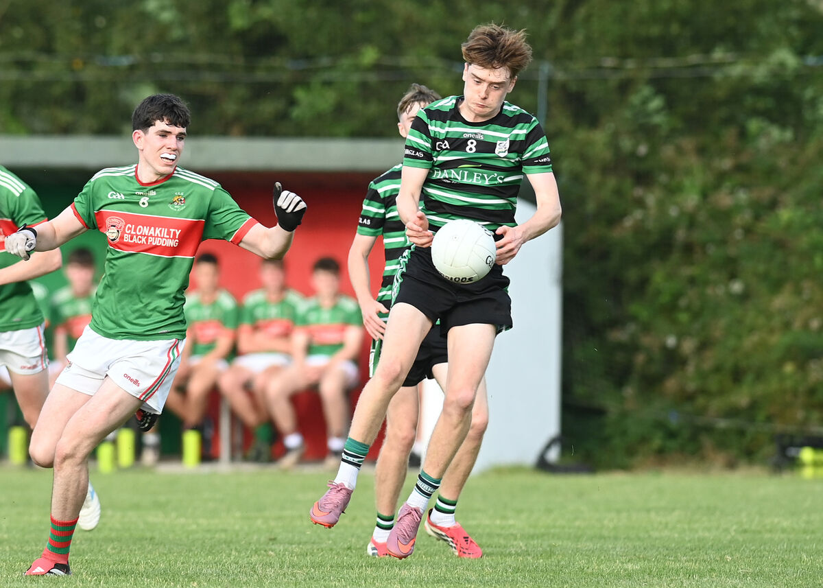 James Naughton of Douglas claims possession with Clonakilty's Éanna Déiseach at close quarters. Picture: Martin Walsh James Naughton of Douglas claims possession with Clonakilty's Éanna Déiseach at close quarters. Picture: Martin Walsh