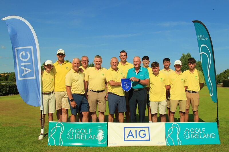 Dave Prendergast (Golf Ireland) presenting Don Coughlan (Douglas) with the AIG Men's Senior Cup pennant.