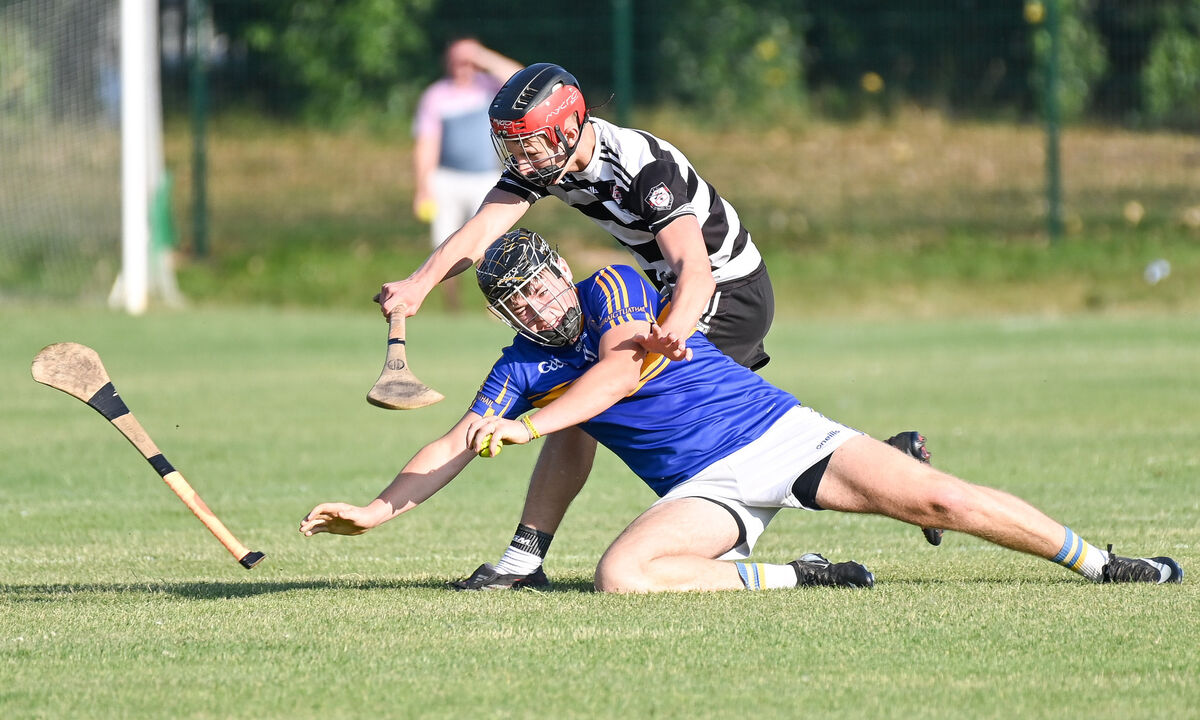  Carrigtwohill's John O'Connor is fouled by Midleton's Alex Molumby during their Premier 1 MHC clash in Midleton. Picture: David Keane.