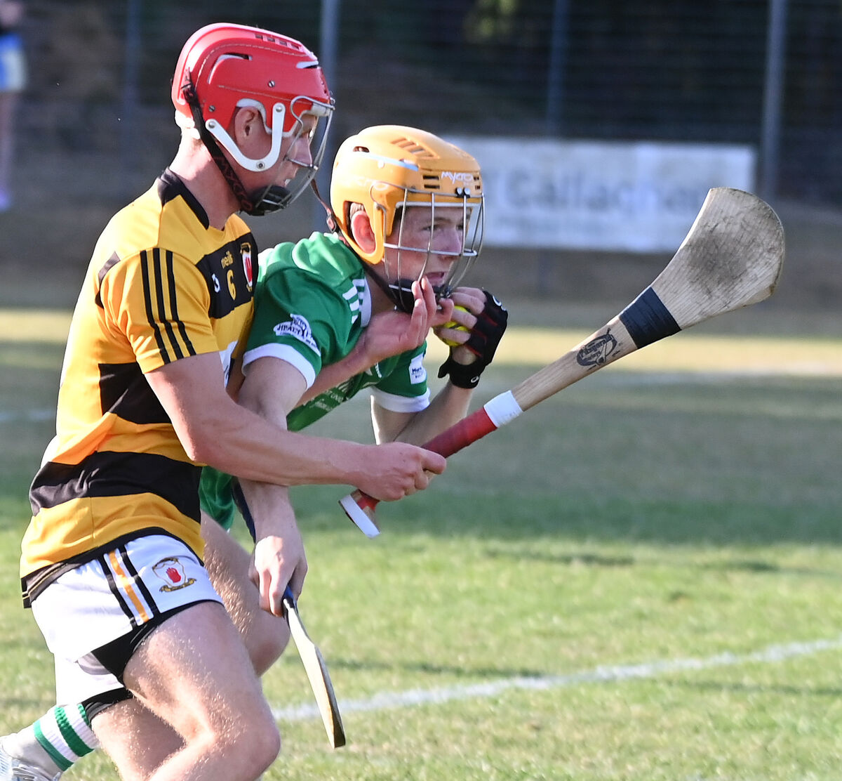 Ballincollig's Daithí Murphy grabs the sliotar ahead of Na Piarsaigh's Ryan Cronin. Picture: Eddie O'Hare