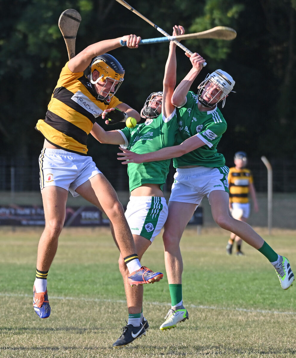 Na Piarsaigh's Jack Cahalane tussles with Ballincollig's Eanna Lynch and Joe Miskella under the dropping ball. Picture: Eddie O'Hare