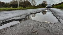 Potentially tyre-ripping potholes on a road in East Sussex 01