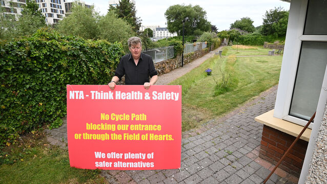 <p>Fr John Fitzgerald, on the grounds near the hospice for the proposed cycle lane at the Sacred Heart church on the Western road. Picture: Eddie O'Hare.</p>
