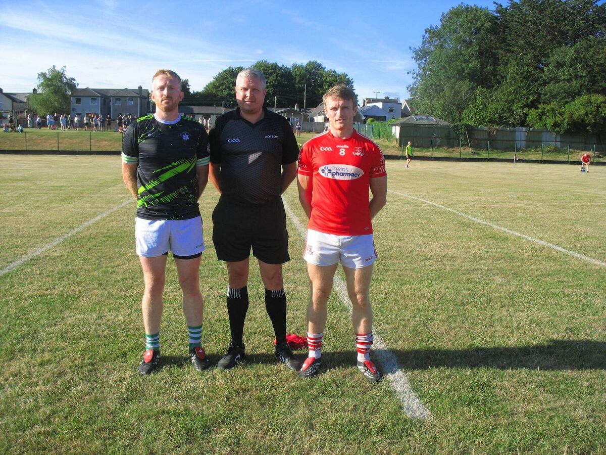Referee Cormac Dineen accompanied by captains James Kind (Passage) and Shane O'Donovan (Mayfield) before their opening AOS Security Seandún Junior A Football Championship opener Referee Cormac Dineen accompanied by captains James Kind (Passage) and Shane O'Donovan (Mayfield) before their opening AOS Security Seandún Junior A Football Championship opener