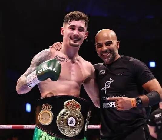 Cork Boxing: Steven Cairns with his trainer David Coldwell after he won the WBA Continental Title last March at the 3Arena. 