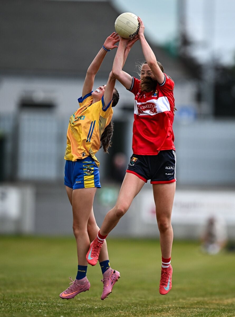 25 July 2026; Róisín Ní Liatháin of Cork in action against Georgia Gerrity of Roscommon during the LGFA ZuCar All-Ireland U18A Championship final match between Cork and Roscommon at Glenisk O’Connor Park in Tullamore, Offaly. Photo by Seb Daly/Sportsfile 25 July 2026; Róisín Ní Liatháin of Cork in action against Georgia Gerrity of Roscommon during the LGFA ZuCar All-Ireland U18A Championship final match between Cork and Roscommon at Glenisk O’Connor Park in Tullamore, Offaly. Photo by Seb Daly/Sportsfile