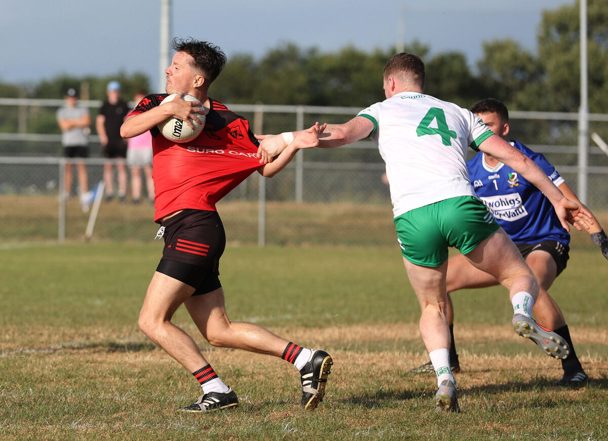 Ben Seartan, Beál Átha'n Ghaorthaidh, is held back by Christopher Mullane, Kanturk. Picture: Jim Coughlan. Ben Seartan, Beál Átha'n Ghaorthaidh, is held back by Christopher Mullane, Kanturk. Picture: Jim Coughlan.