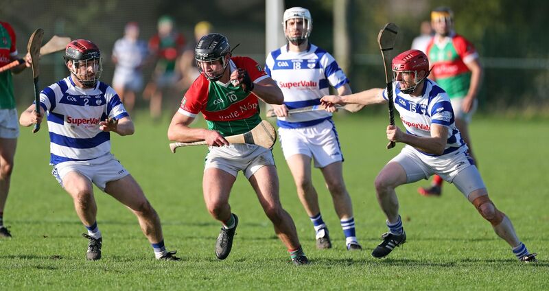  Conor Quirke of Ballinora up against Brian Gould and John Casey of Inniscarra. Picture: Jim Coughlan
