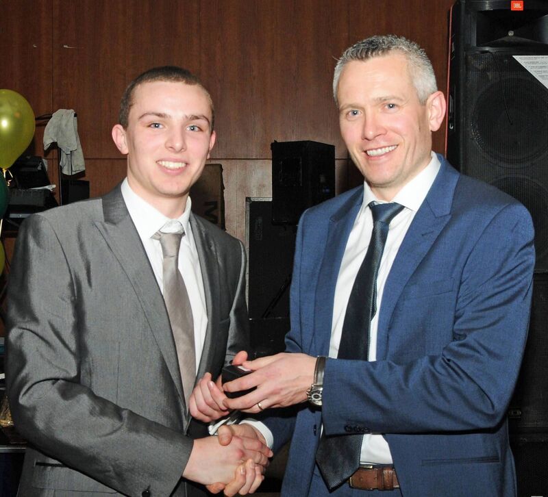 John Browne, Blackrock U21 manager, presenting medals to U21 captain Elliot Cantwell. Picture: George Hatchell