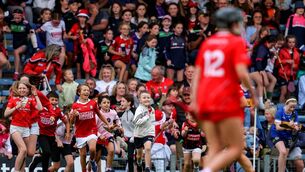 <p>Young Cork fans run onto the pitch after the win over Tipp on Saturday. Picture: INPHO/Bryan Keane</p> <p>Young Cork fans run onto the pitch after the win over Tipp on Saturday. Picture: INPHO/Bryan Keane</p>