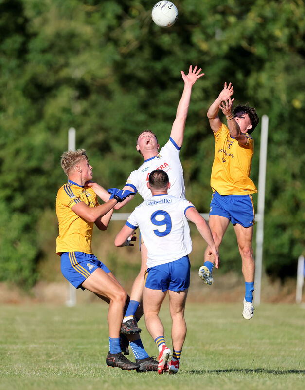 Thomas Egan and John Wiggington Barrett, St Finbarr's, battle Patrick Mellett and Jack McCarthy, Carrigaline. Picture: Jim Coughlan.