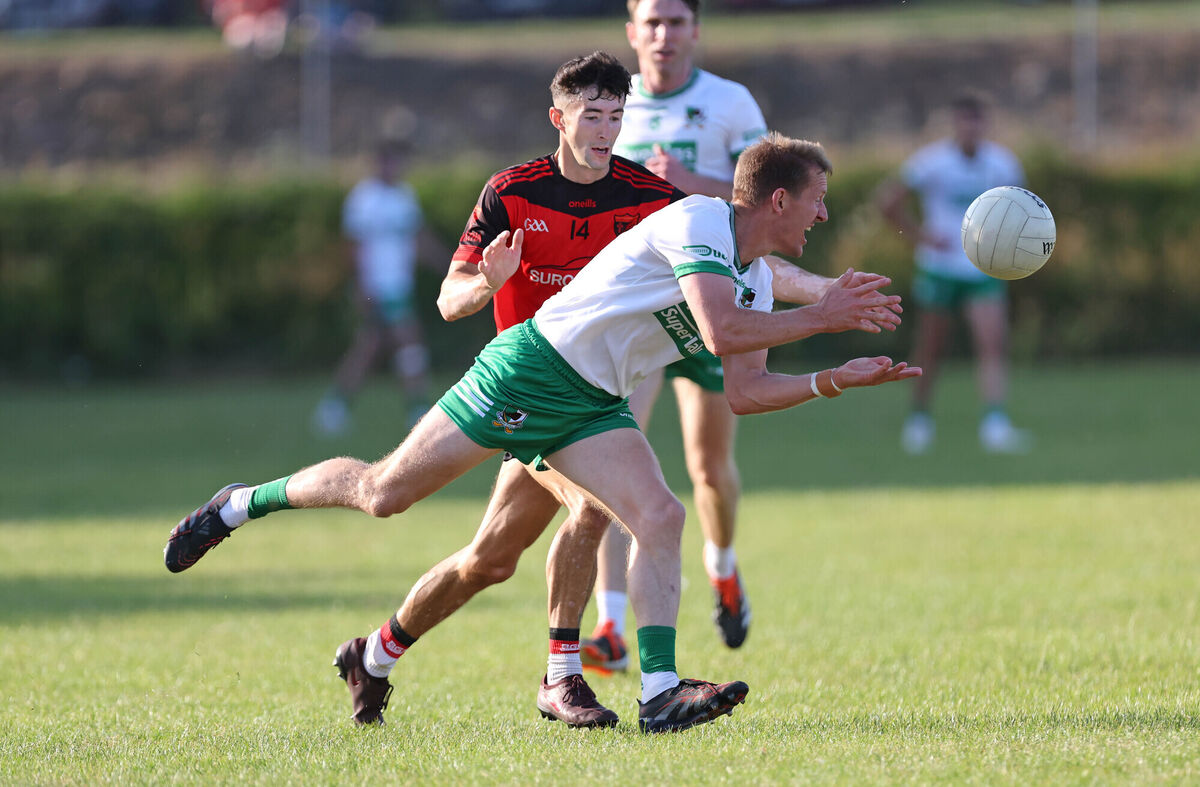 Sean Ó Muimhneachain, Beál Átha'n Ghaorthaidh, tackling John McLoughlin, Kanturk. Picture: Jim Coughlan. Sean Ó Muimhneachain, Beál Átha'n Ghaorthaidh, tackling John McLoughlin, Kanturk. Picture: Jim Coughlan.