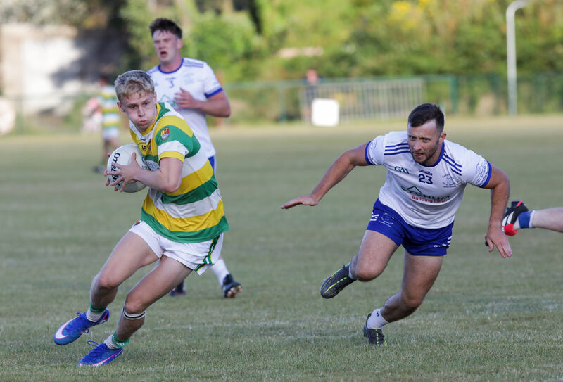 Ross' Dylan O'Neill is chased by Cill na Martra's Daire Mac Lochlainn. Picture: David Creedon Ross' Dylan O'Neill is chased by Cill na Martra's Daire Mac Lochlainn. Picture: David Creedon