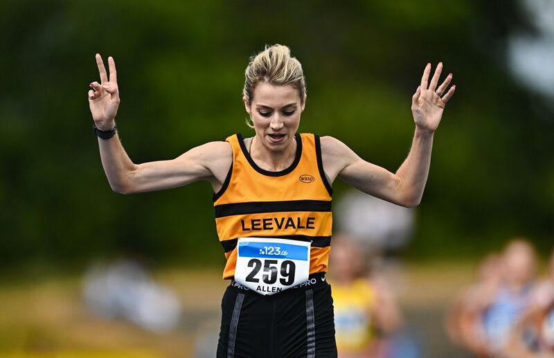 Niamh Allen of Leevale A.C., Cork, crosses the finish line to win the women's 5000m final during day two of the 123.ie National Senior Track &amp; Field Championships 2026 at Morton Stadium in Dublin. Photo by Tyler Miller/Sportsfile