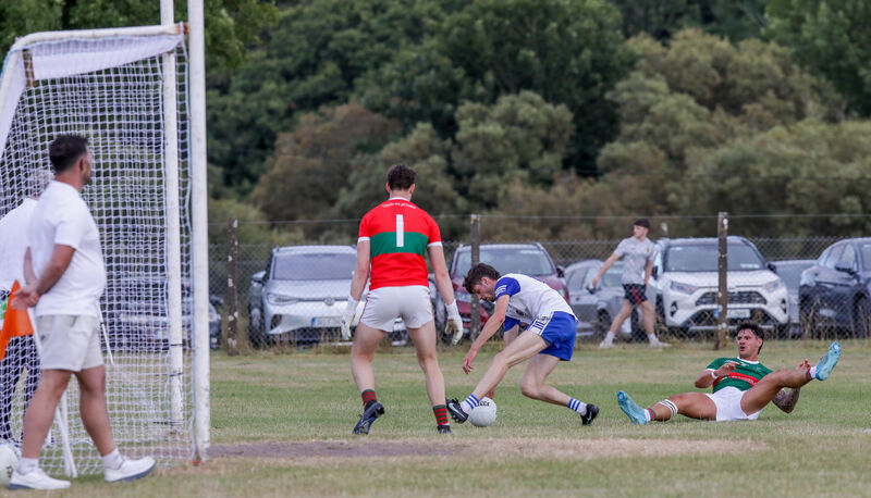 Knocknagree's Killian Cronin tries to pick up the ball in the Clon square. Picture: David Creedon